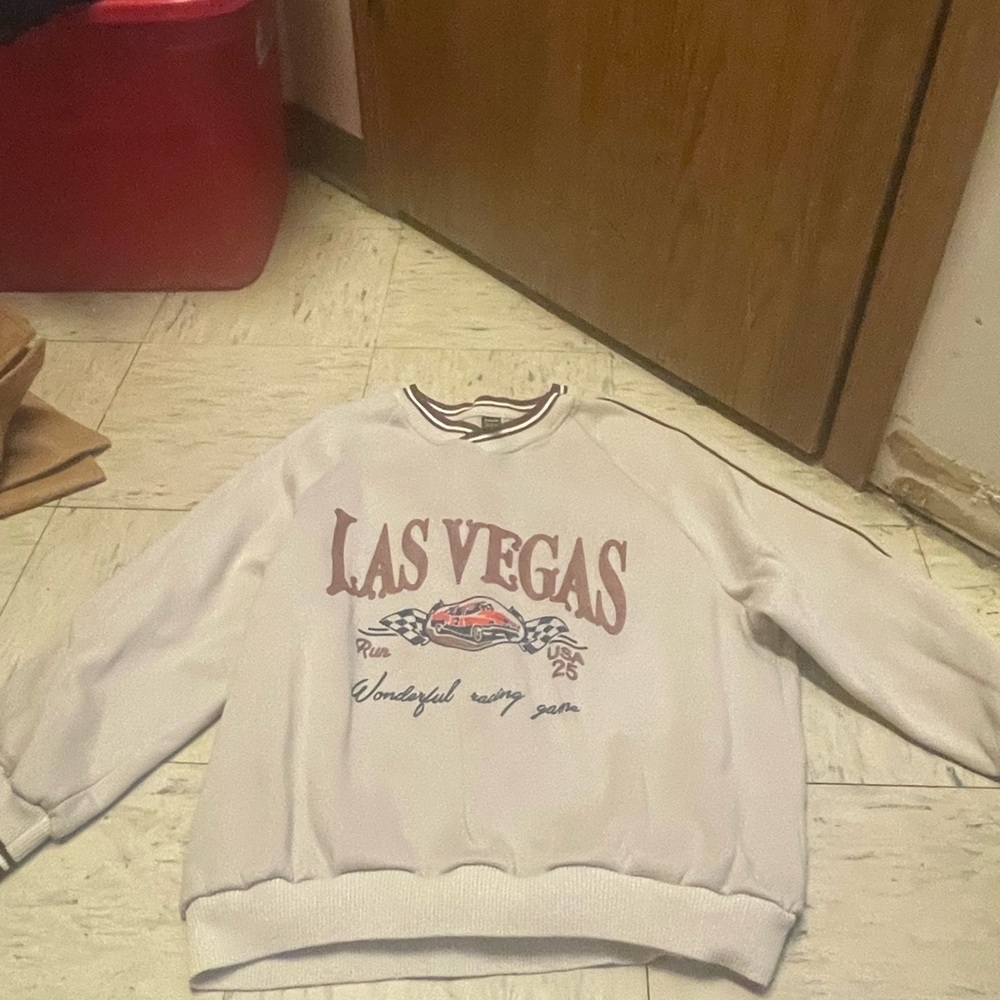 Young lady oversized Las Vegas sweatshirt
